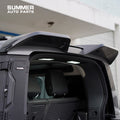Installed rear loadspace LED roof light illuminating the tailgate area on Land Rover Defender L663