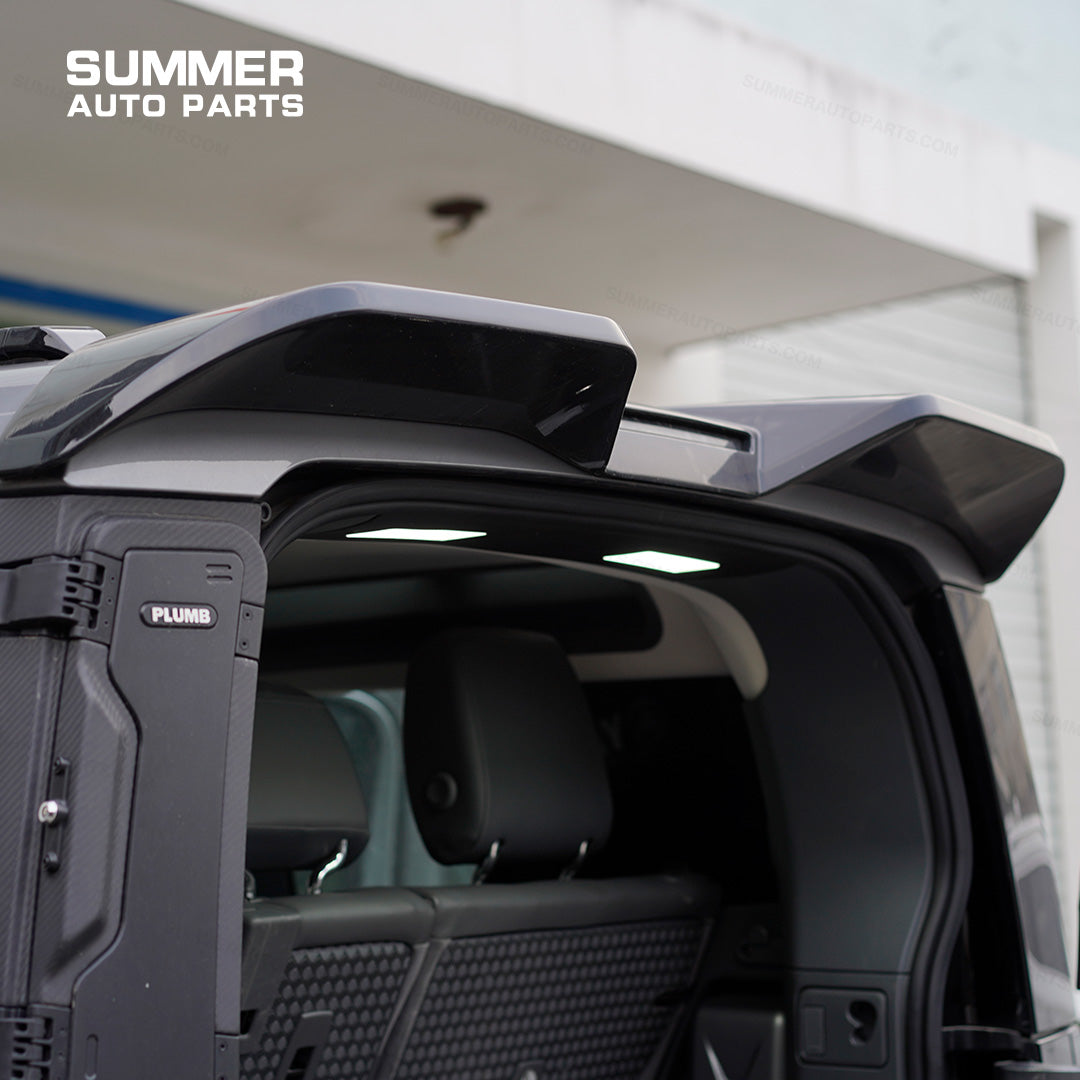 Installed rear loadspace LED roof light illuminating the tailgate area on Land Rover Defender L663