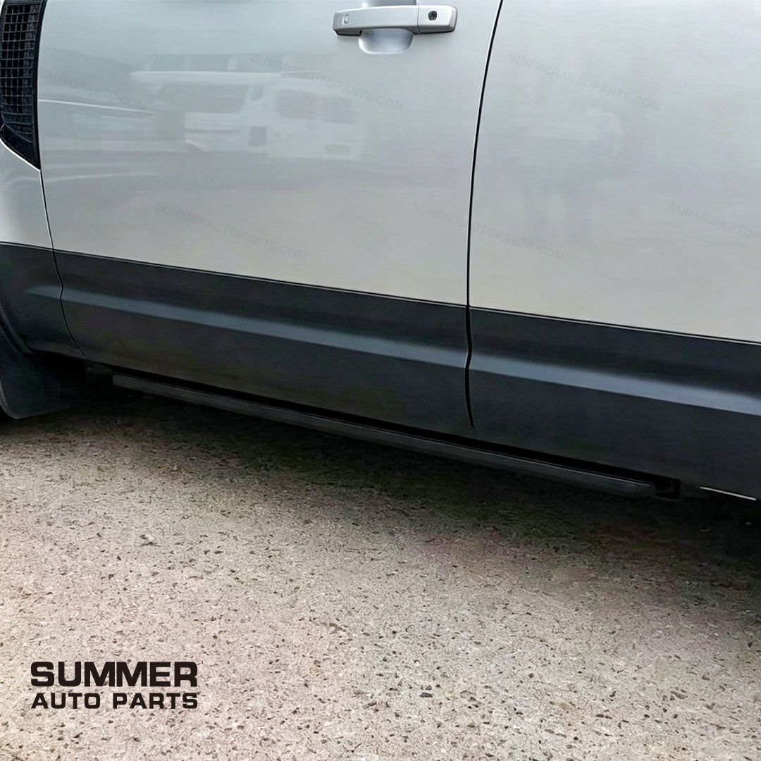 Installed deployable electric side step in retracted position on Land Rover Defender 110 L663