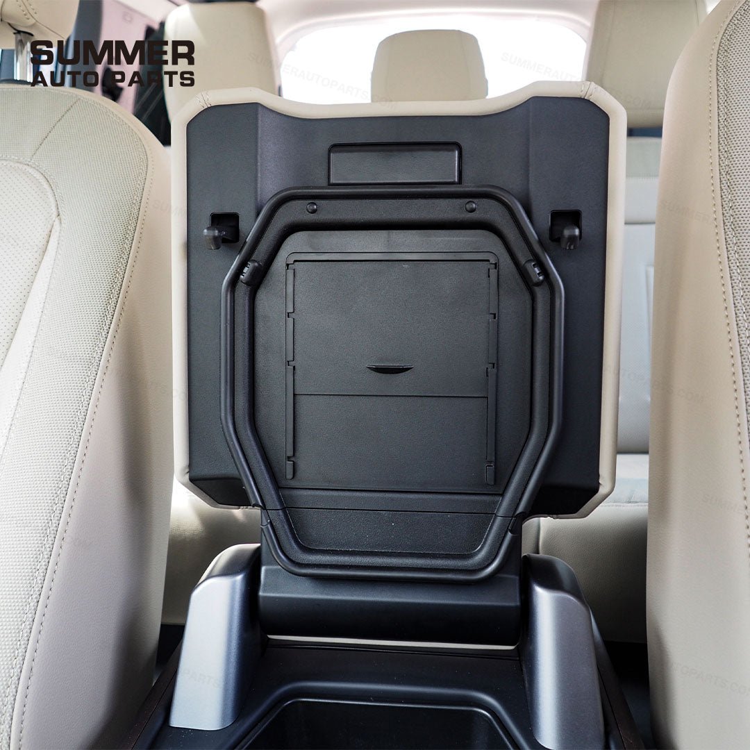 Installed armrest cover privacy storage box on Land Rover Defender L663 with closed lid
