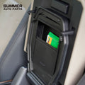 Open armrest cover privacy storage box in Land Rover Defender L663 holding wallet and cards