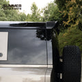 Rear side view of OCTA style forged carbon roof spoiler installed on Land Rover Defender L663