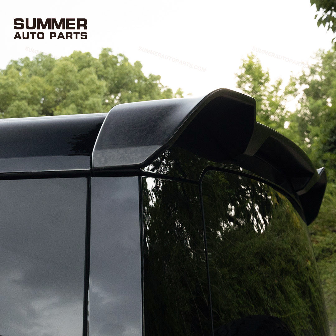 Close-up of OCTA style forged carbon rear roof spoiler installed on Land Rover Defender L663