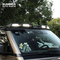 Installed forged carbon fiber roof light bar on Land Rover Defender L663 windshield top