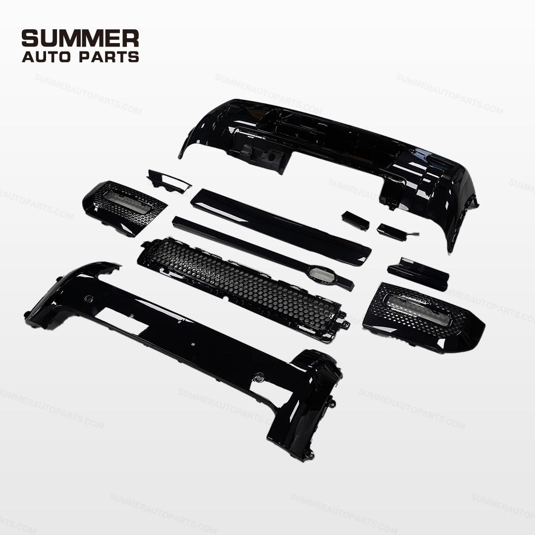 Angled view of 007 style gloss black bumper kit parts for Land Rover Defender L663