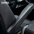 Detail view of black front seat armrest installed on Land Rover Defender L663