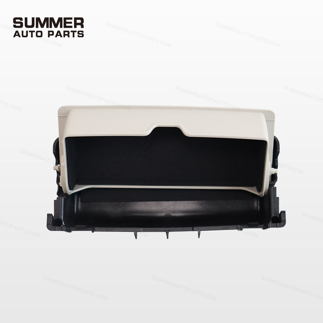 Open beige overhead sunglasses holder for Land Rover Defender L663 showing storage compartment