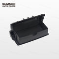 Open black overhead sunglasses holder for Land Rover Defender L663 showing storage compartment