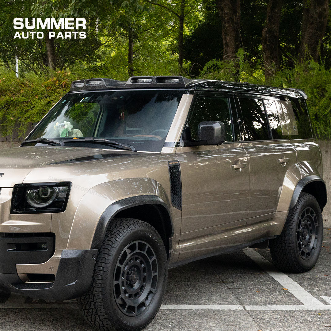 Land Rover Defender L663 with forged carbon side mirror covers installed