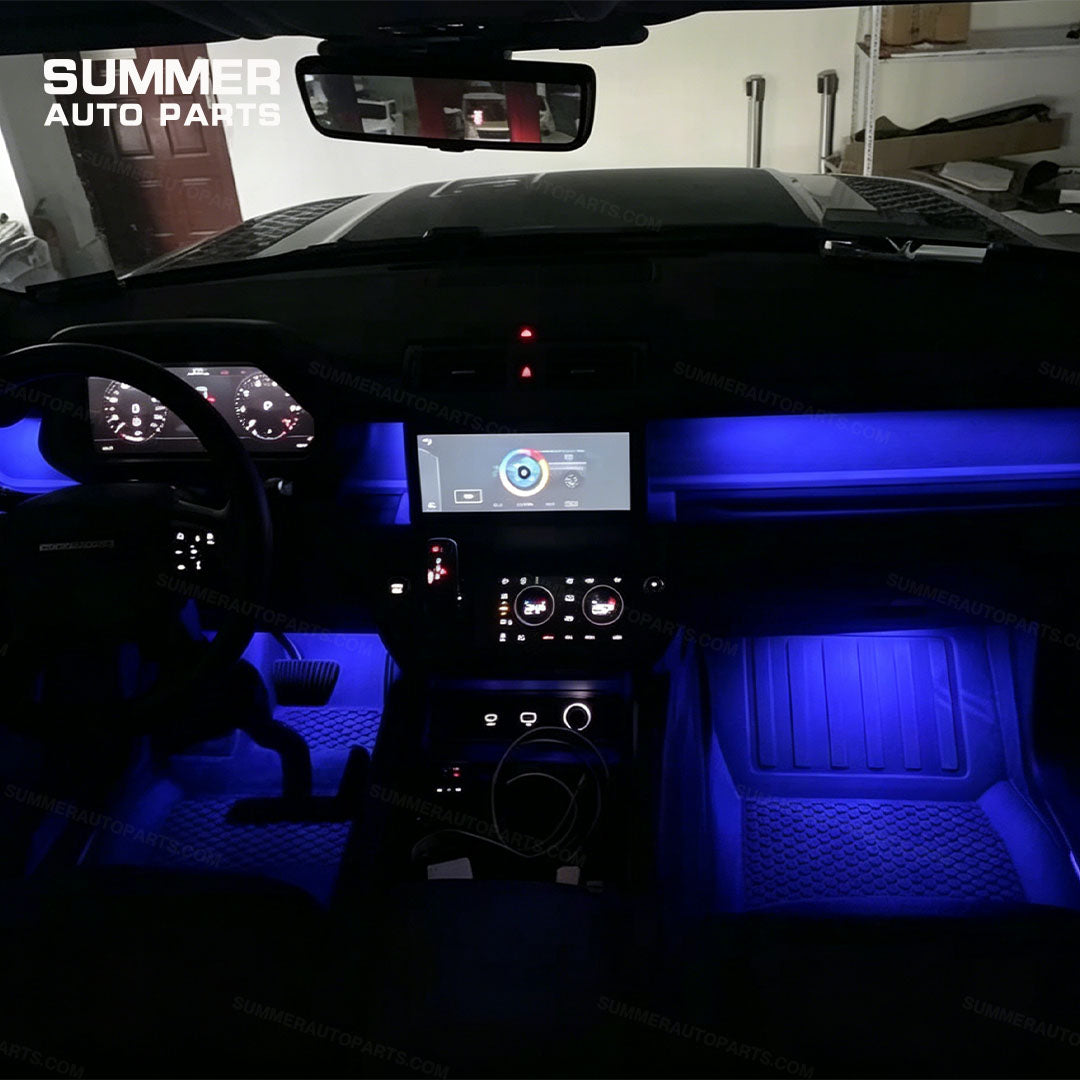 Blue dashboard and footwell ambient lighting installed inside Land Rover Defender L663
